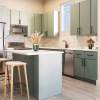 kitchen with green cabinets