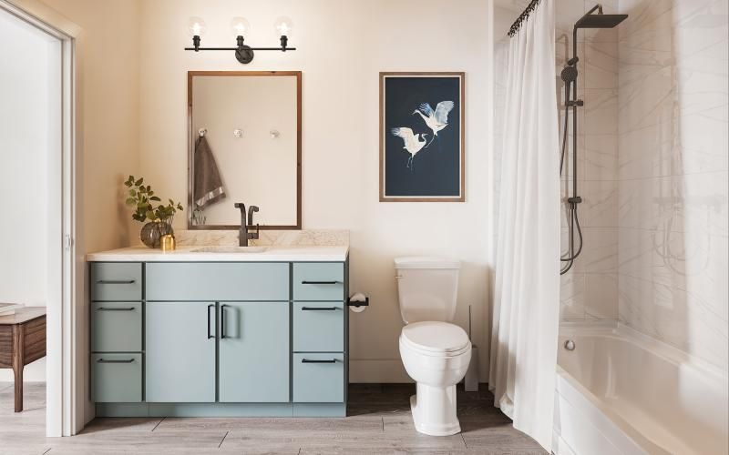 a bathroom with a toilet and bathtub